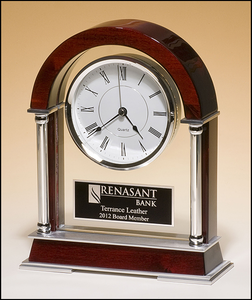 Airflyte Mantle clock with rosewood piano-finish wood, chrome-plated posts and brushed silver aluminum accents
