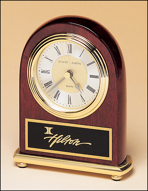 Airflyte Rosewood stained piano finish Airflyte clock on a brass base