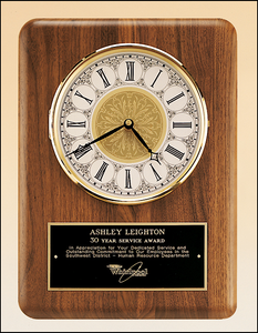 Airflyte American walnut vertical wall clock with Solid brass diamond-spun bezel with glass lens and ivory dial