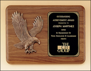 Airflyte American walnut plaque with a sculptured relief eagle casting