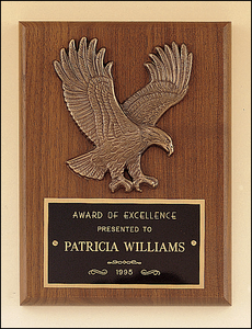 Airflyte American walnut plaque with a sculptured relief Eagle casting