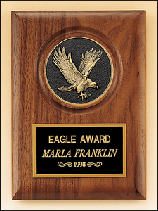 Airflyte American walnut plaque with a finely detailed black and gold Eagle medallion