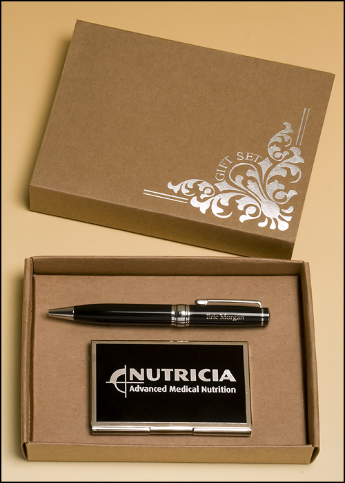 Airflyte Chrome plated pen and business card case with black accents. Eco-friendly packaging